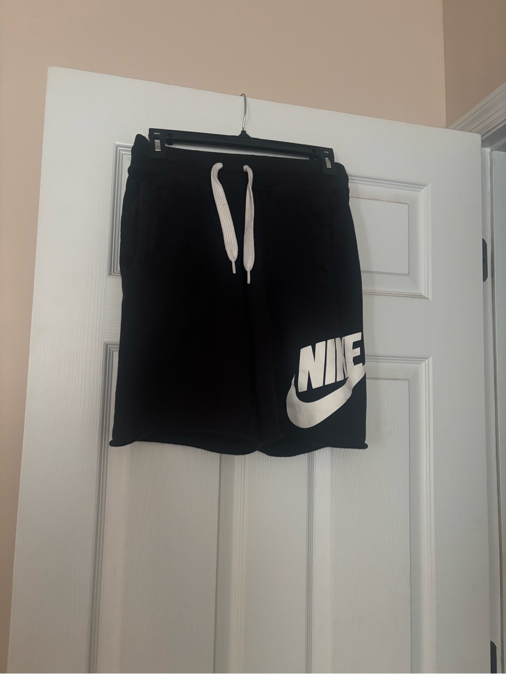 Nike Black Athletic Shorts with White Swoosh